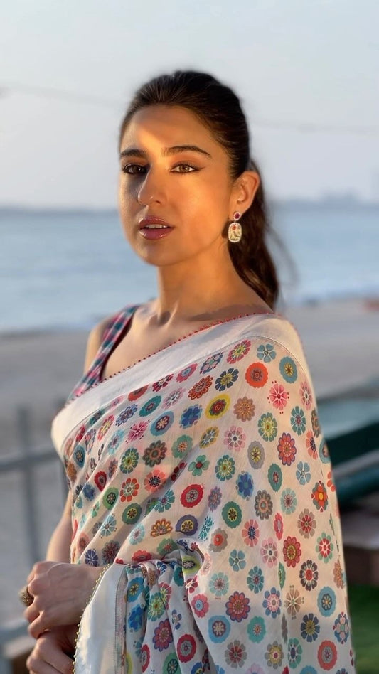 "Close-up of the Sprinkle Flower Saree, showcasing the digital floral print on high-quality Linen fabric, highlighting the intricate details of the design."